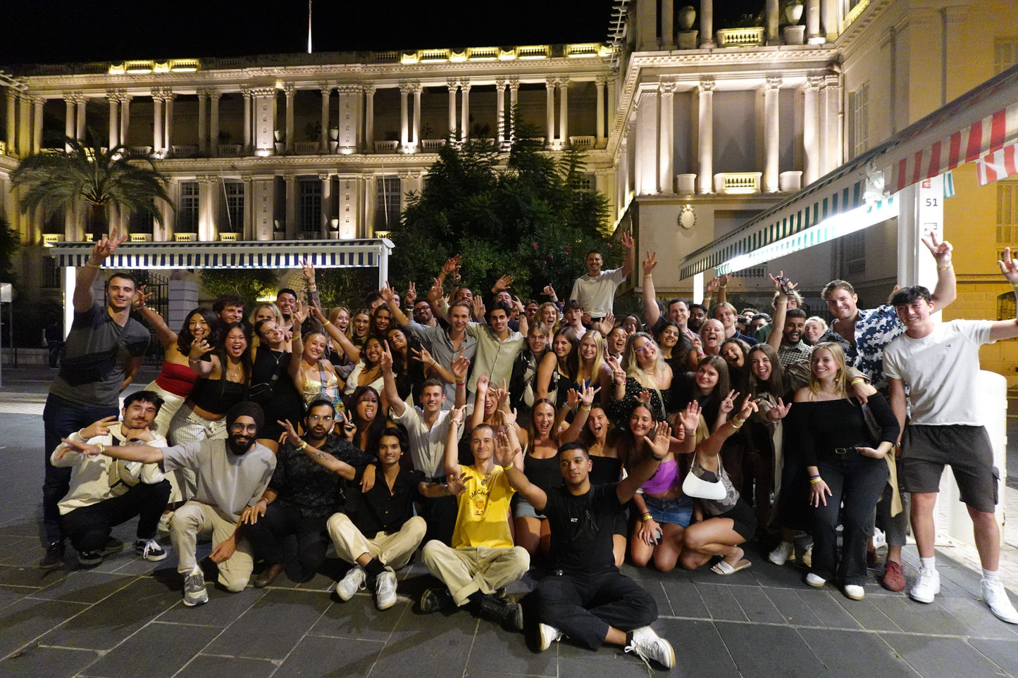 Young international crowd enjoying a fun pub crawl in Nice with Beer&Dash nightlife experience.
